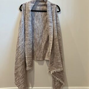 Express 2-n-1 scarf and vest combo. It can be worn as shown vest, or wrap bin 18